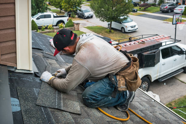 Professional Roofing technician working in Greenville, RI
